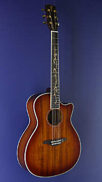 You`s, glossy finished Acoustic Guitar in Grand Auditorium shape with solid koa top and koa on back and sides, with pickup